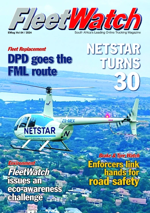 FleetWatch magazine cover with helicopter over cityscape.
