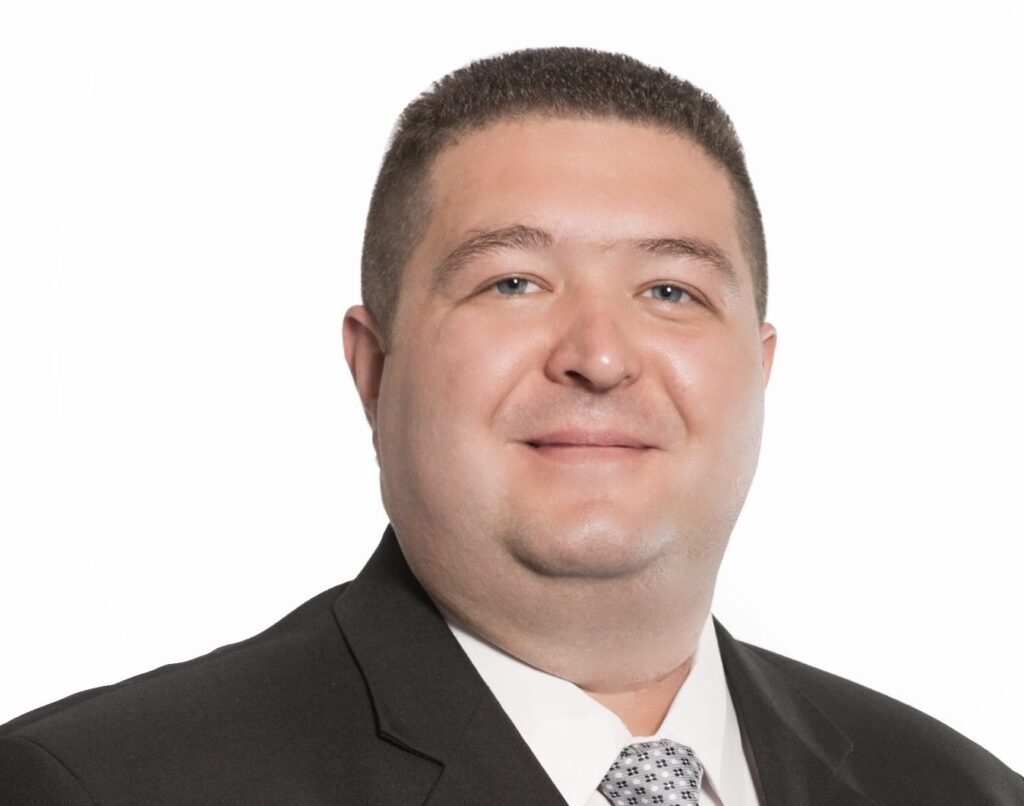 Man in suit and tie headshot